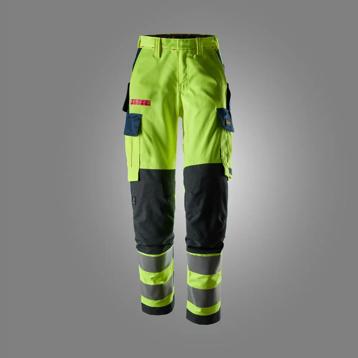 Snickers 6367 Flammehemmende Arbeidsbukse med stretch for dame, High-Vis klasse 2 i Vis gul/Marineblå